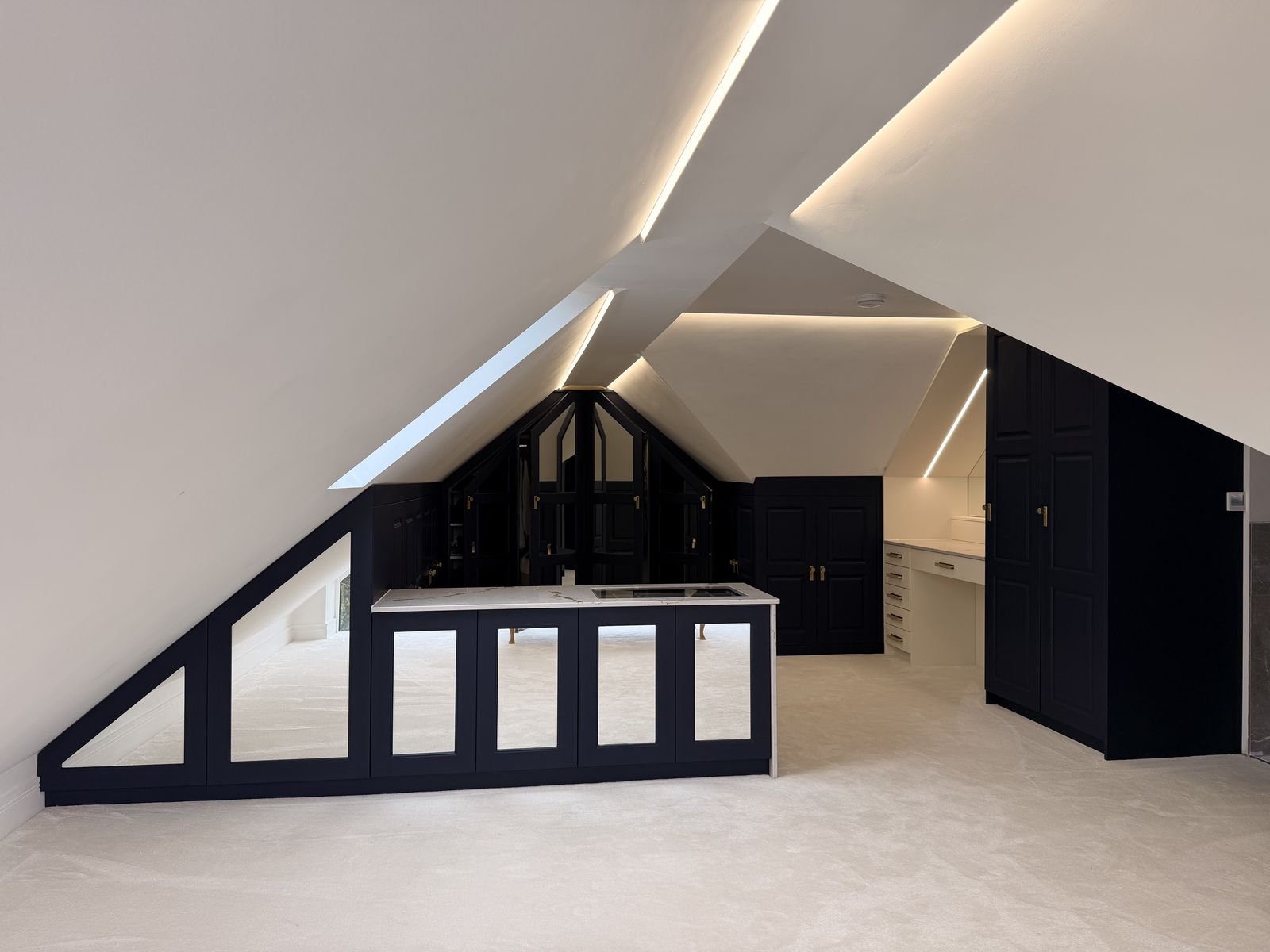 The loft dressing room, built into every angle of the roof